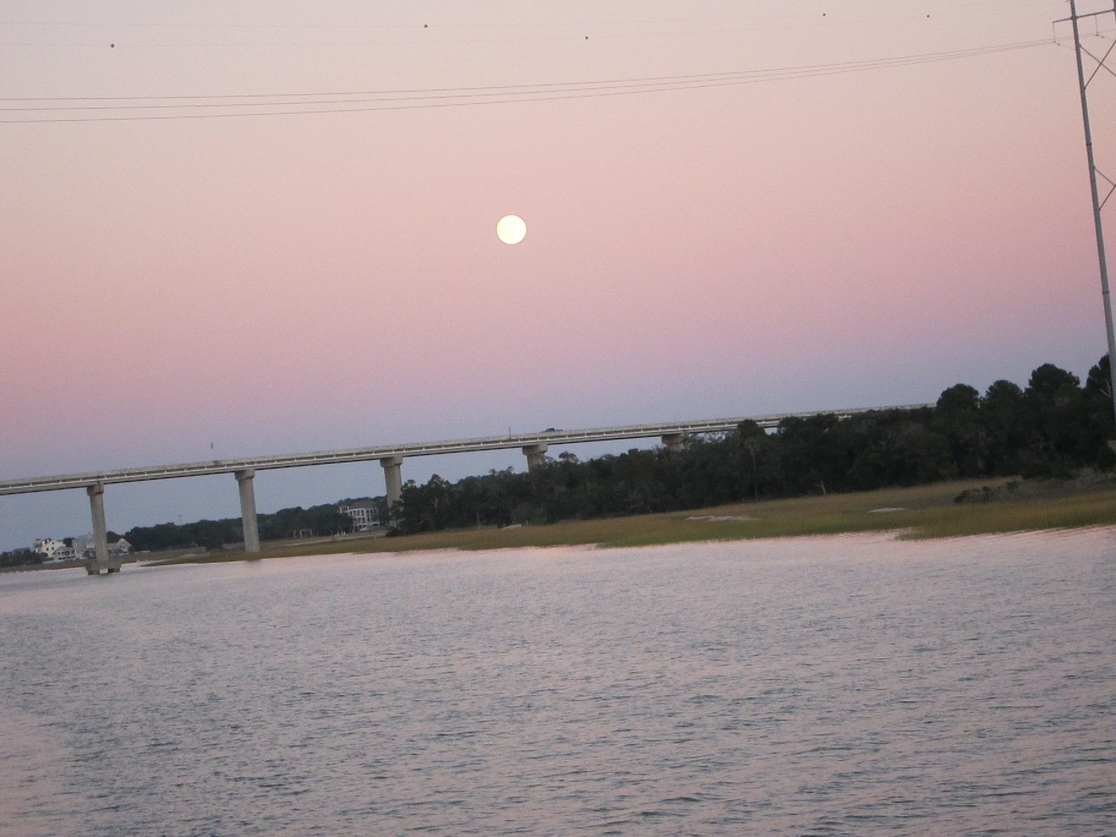 The full Carolina moon was rising as the sun was setting.  Beautiful evening