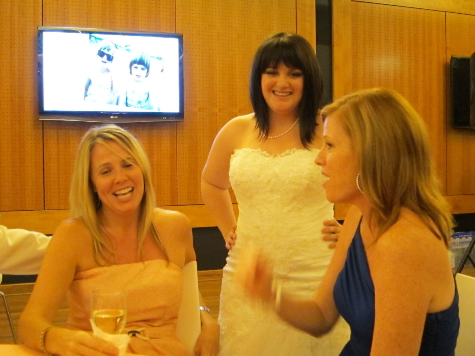 Great childhood pictures were on the screens all through the reception.  Here Tiffany, Grace and...
