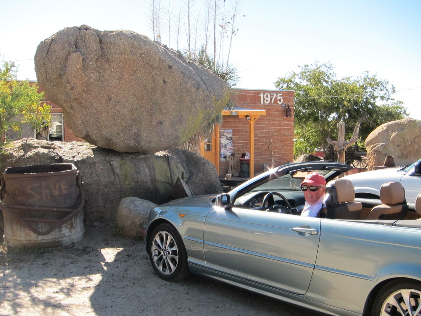 with a slightly different vehicle stopped for lunch.  The adobe building at 1975 is the Casa...