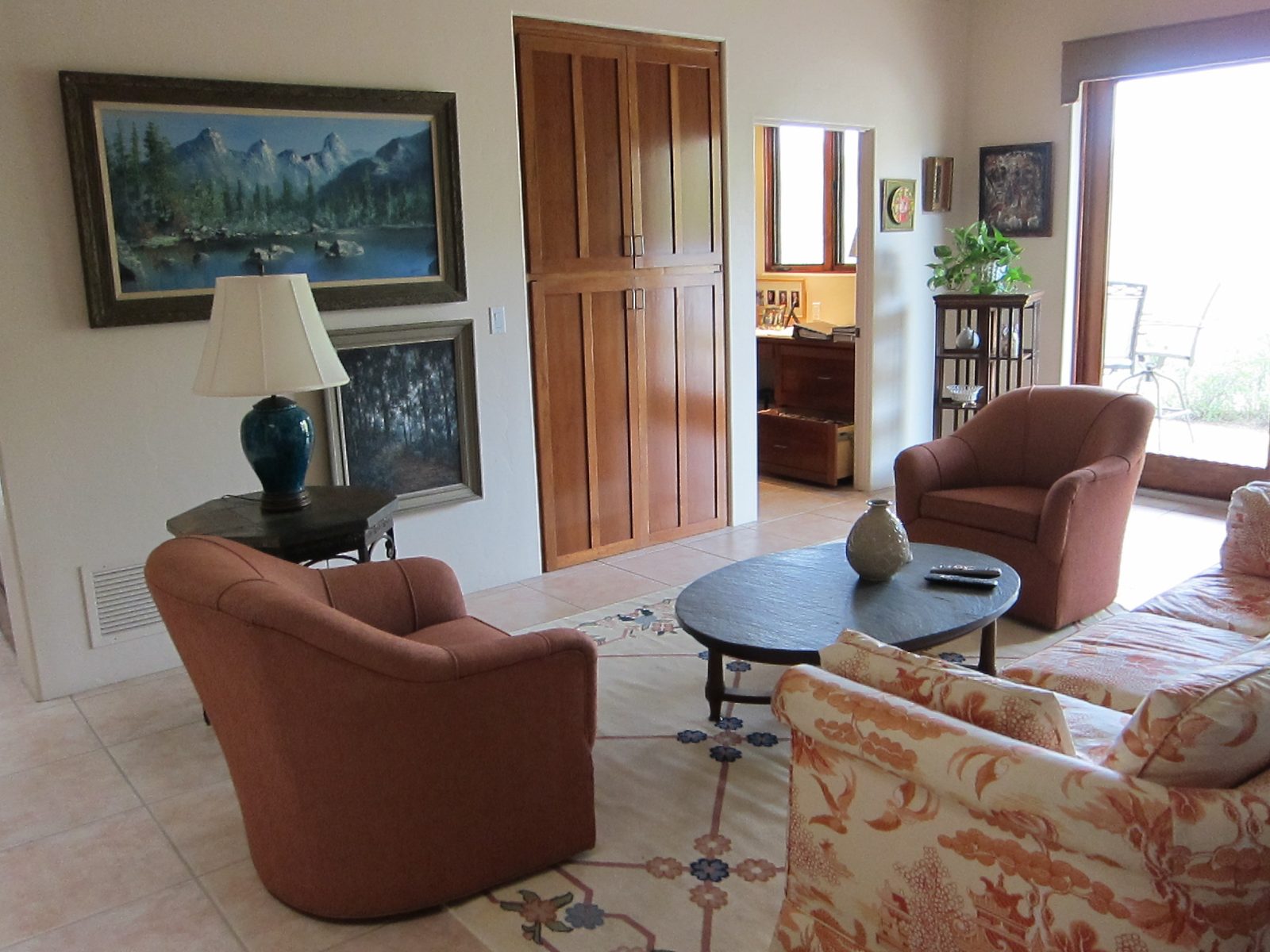 Slate table has moved from LR into Family room.