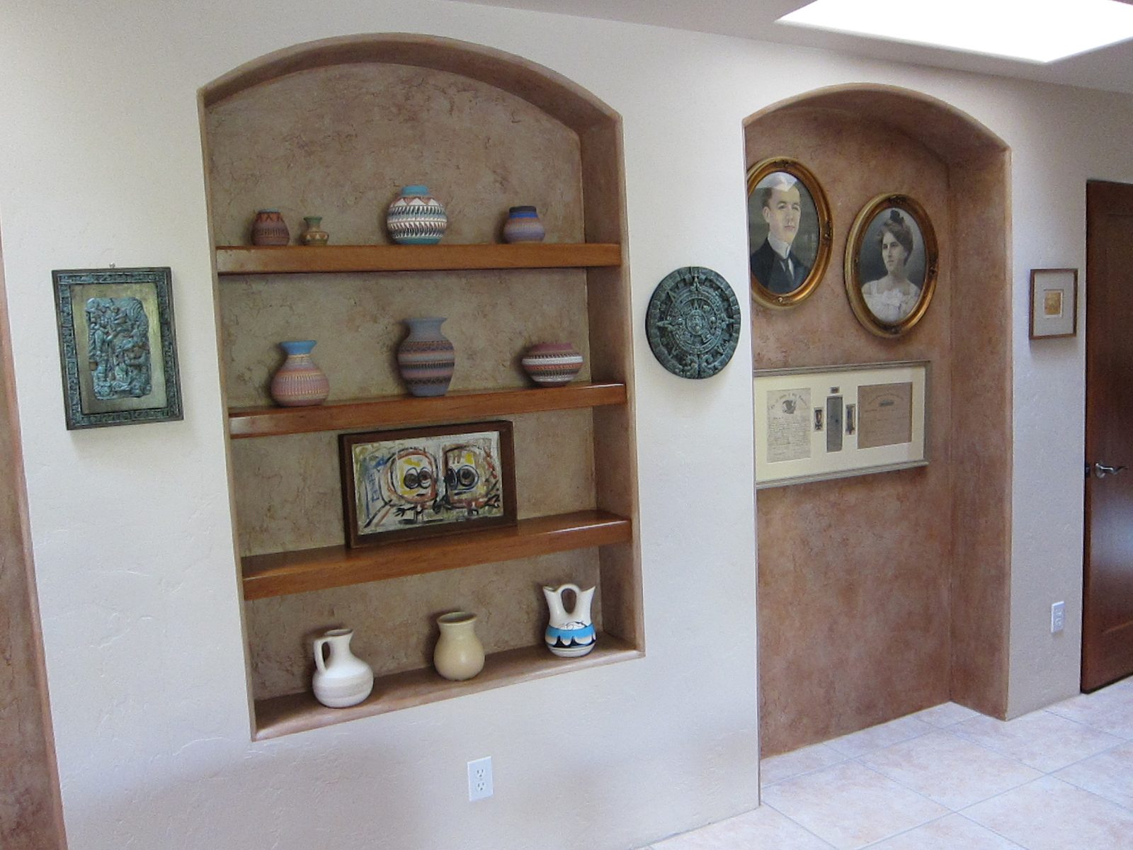 I like to think of the two figures in the painting on the Indian bowls shelves as Peter and me...