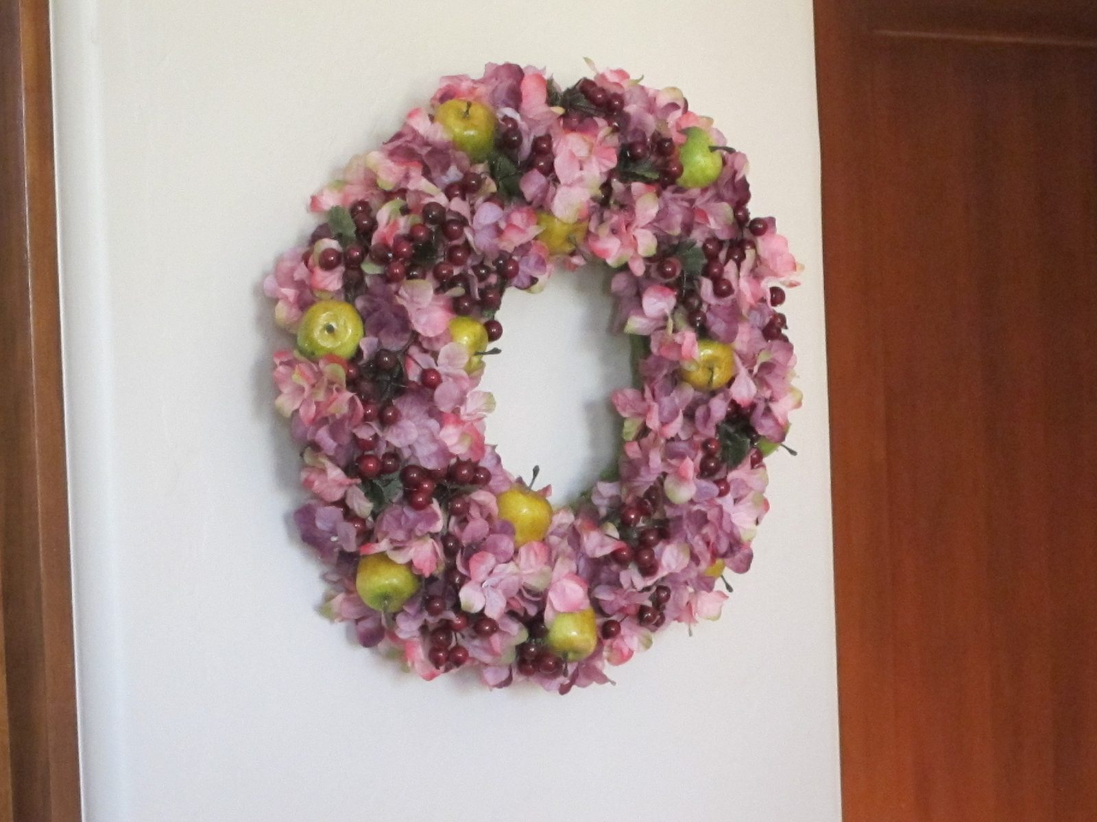 Unusual colors in a Christmas wreath, but they work nicely in this corner, I think.
