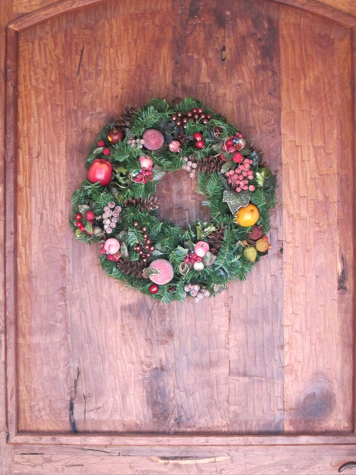 Front door wreath .. .had used indoors in CT, but think it's safe here.