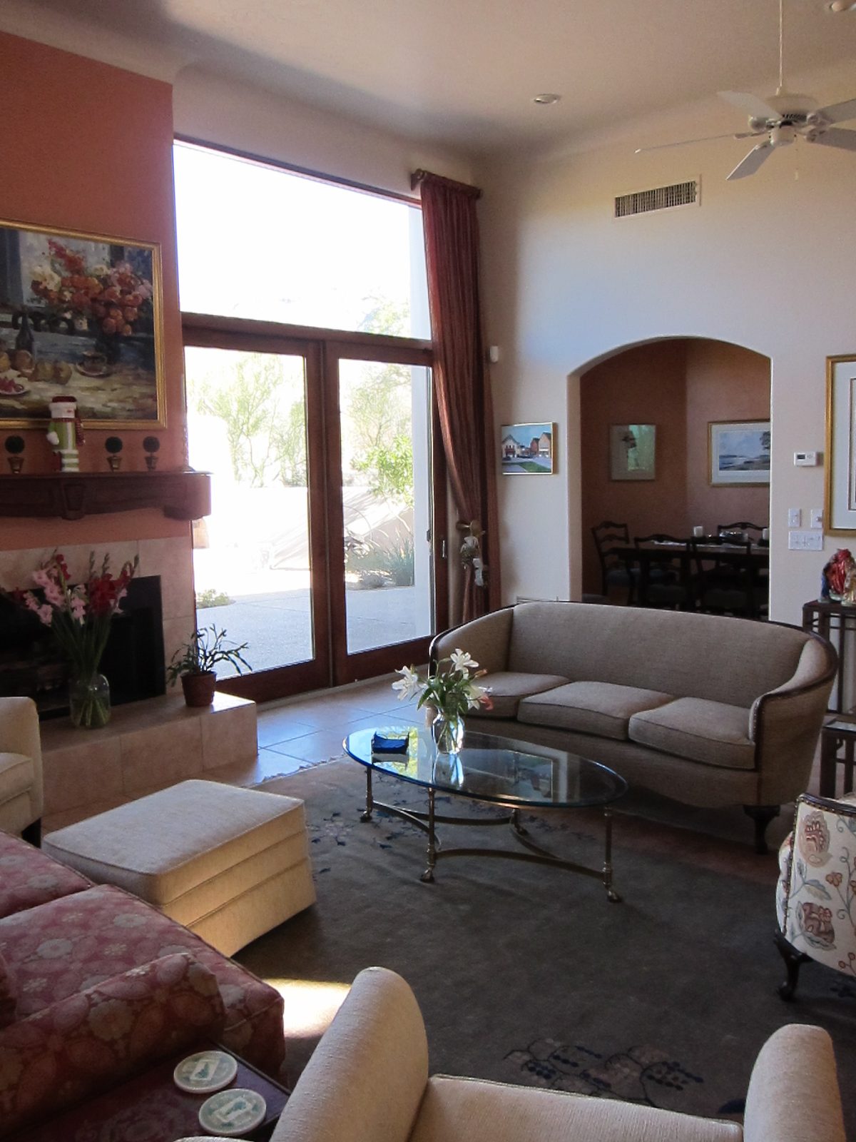 A view of the empty corner, crying for a Christmas tree.  The ceiling is 14'.  How high the...