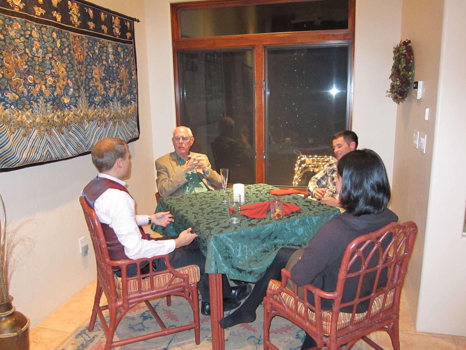 Glenn Bacon at the children's table with Jay, Monica and John