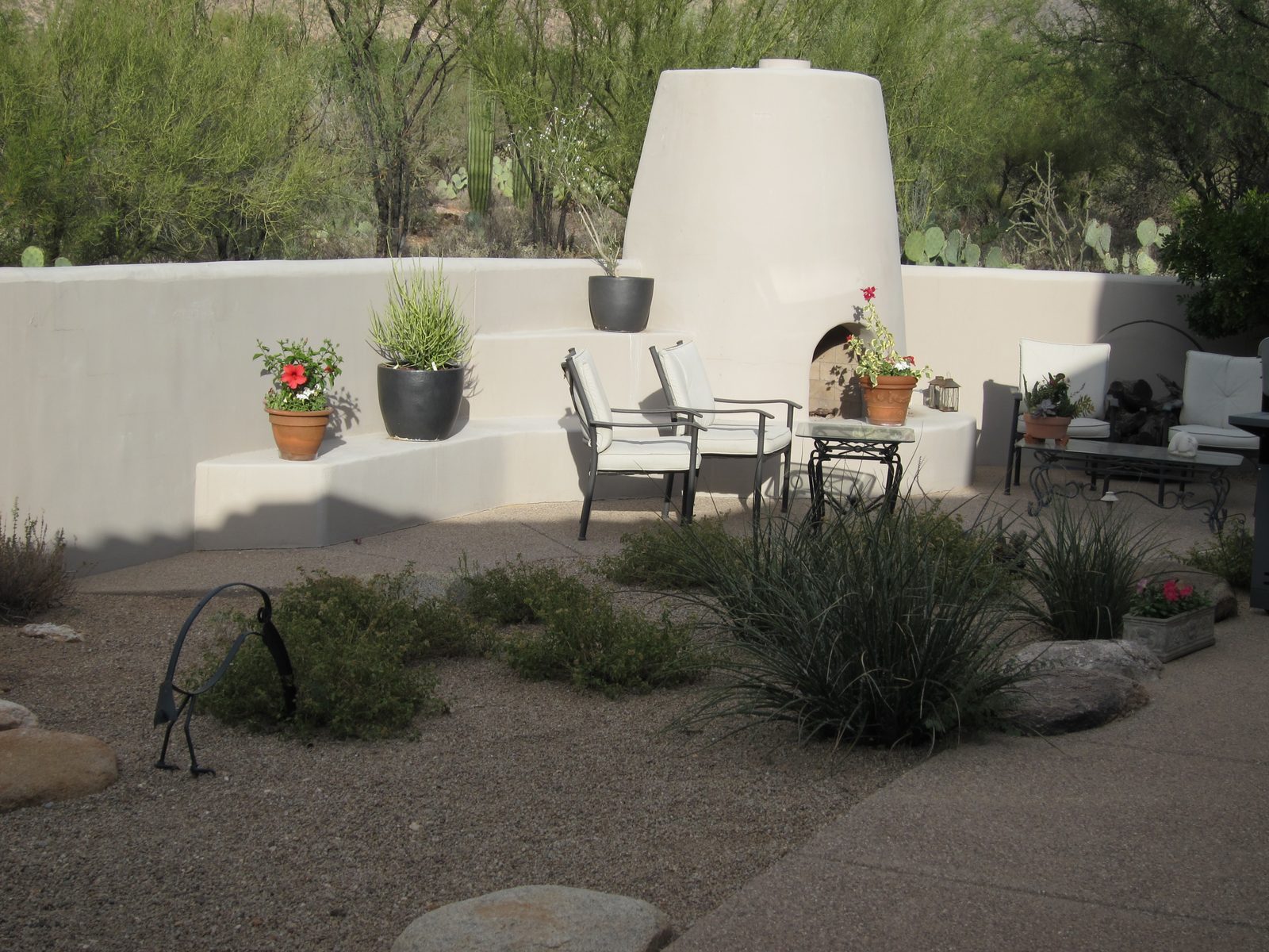 Our current seating by the kiva.  Not sure how we're furnishing the new area.  Not the best time...