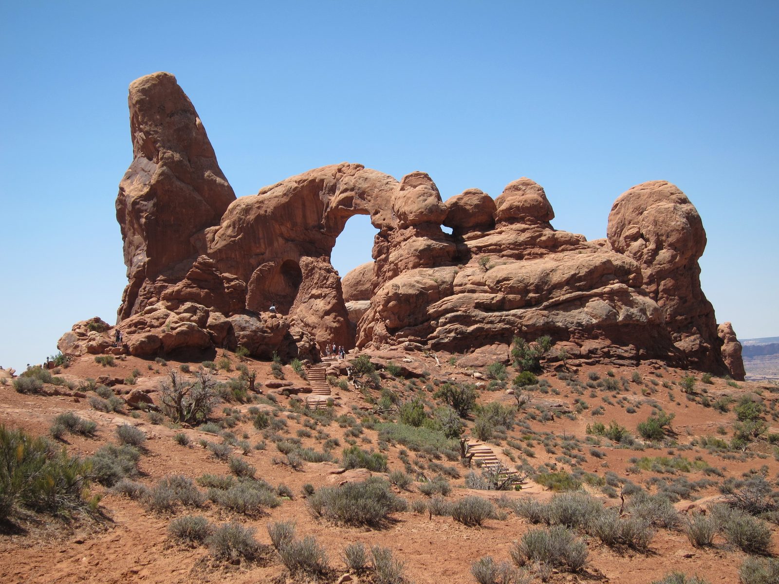 This is North Window Arch.  You can see the stairs starting near the lower right, continuing up...