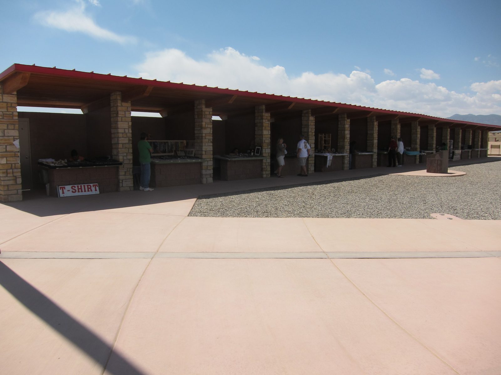 A better view of the merchant.  Shops are completed on two sides, and they were working on the...
