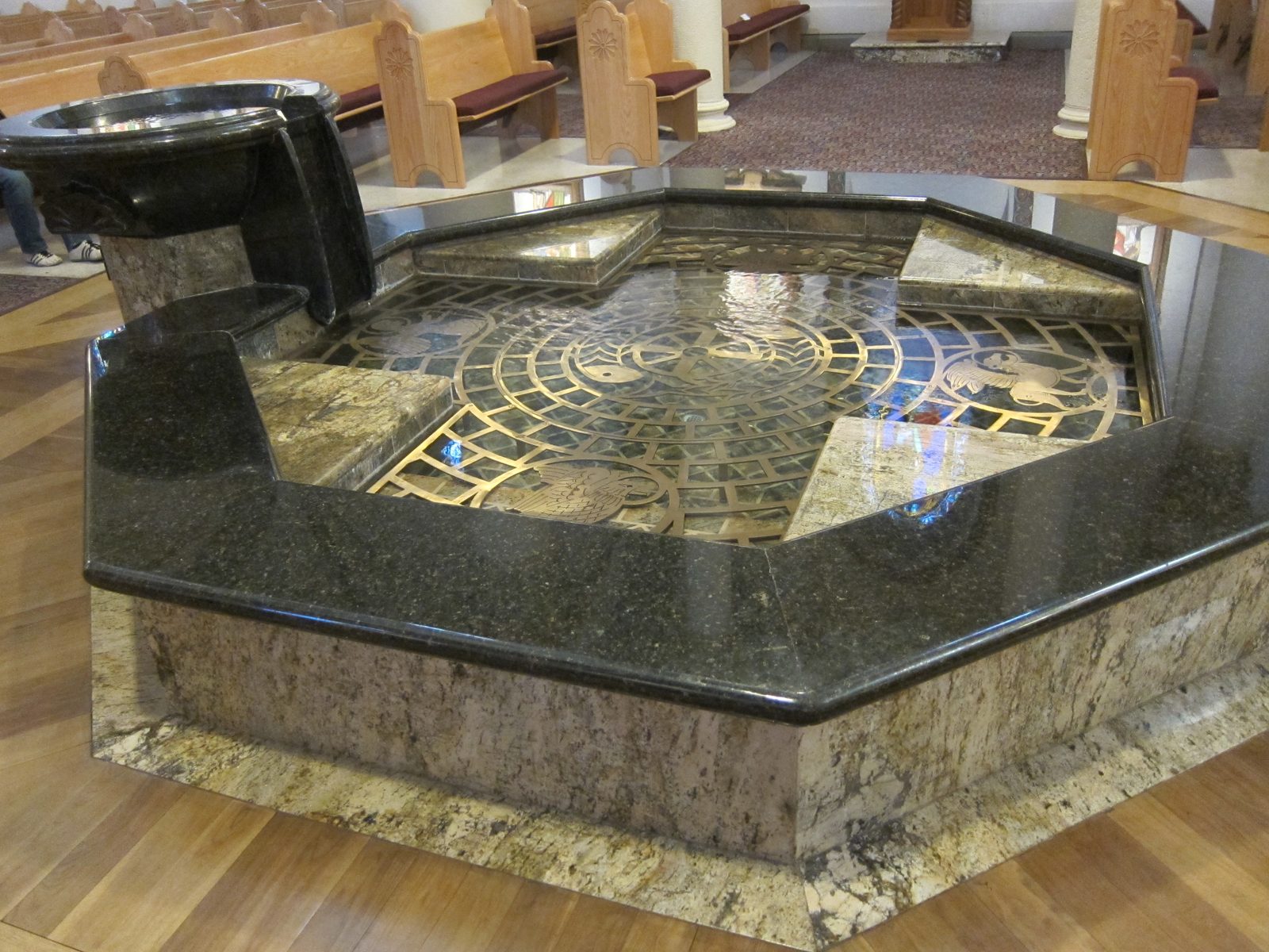 Very interesting baptismal font.  Practically a spa