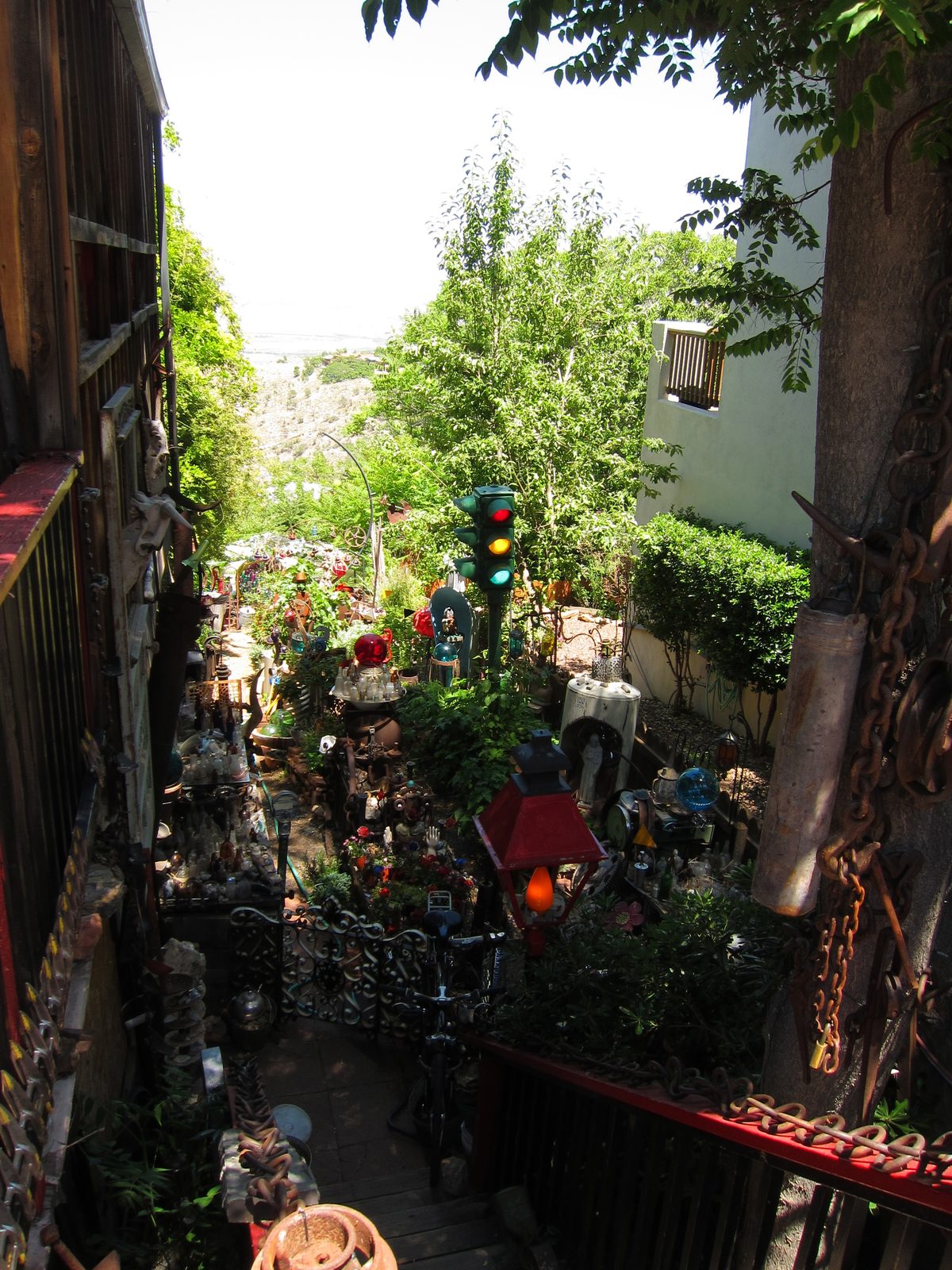 View from an upper street, looking though a make shift gallery, to a lower street in Jerome.
