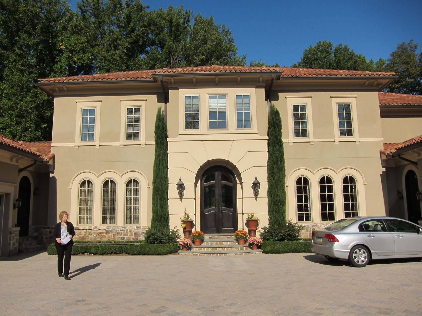 Aunt Judy in front of the new house in McLean Virginia