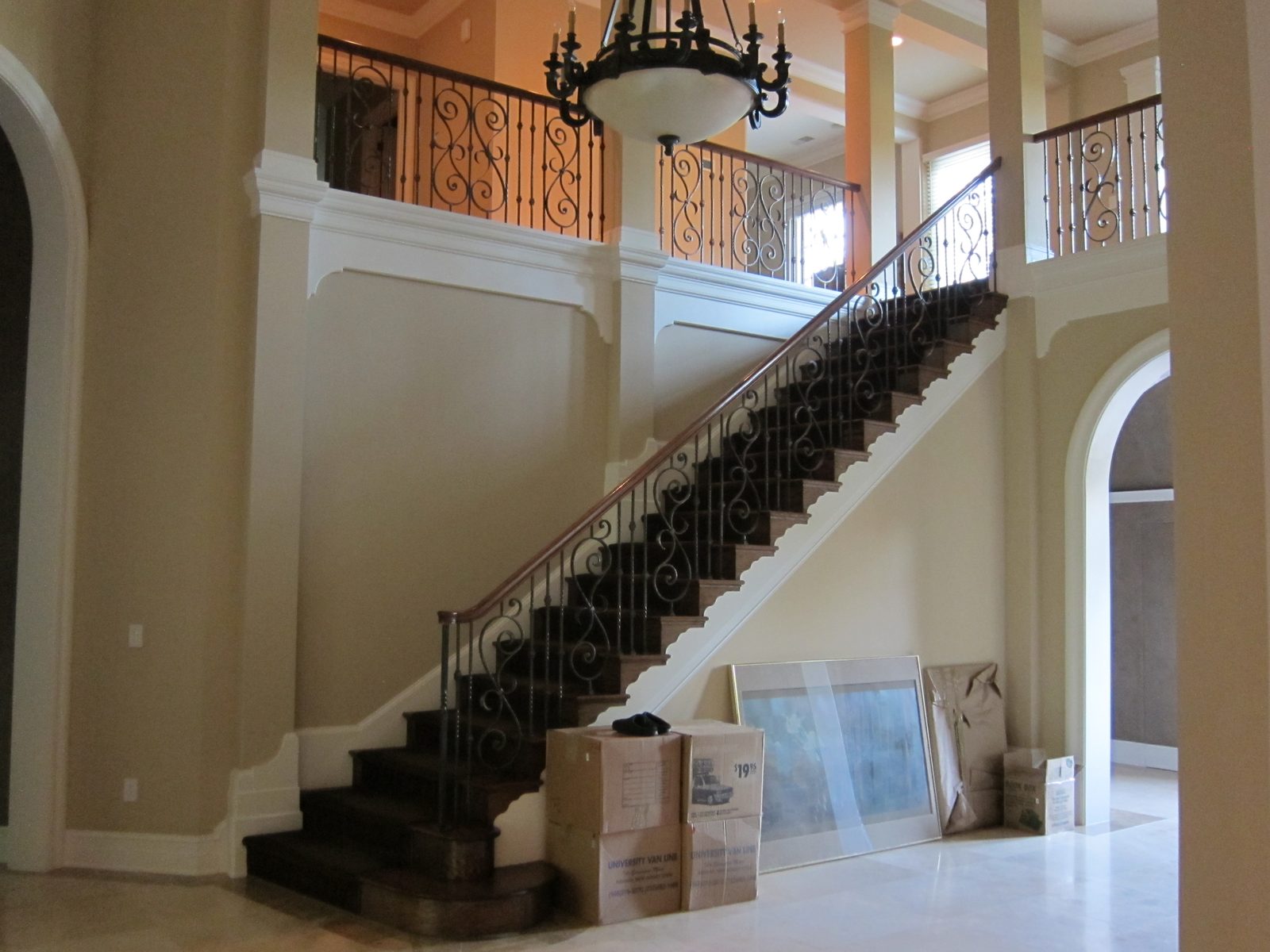 Front door is to the right of this picture which shows the stairs to the second floor.