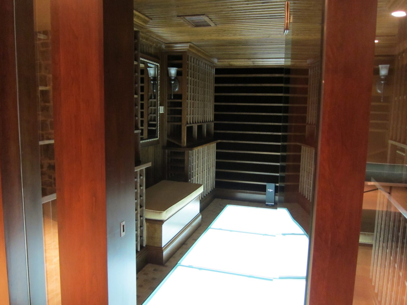 Walk in wine cellar which has a "frosted" glass floor with lighting underneath it.  I forget how...