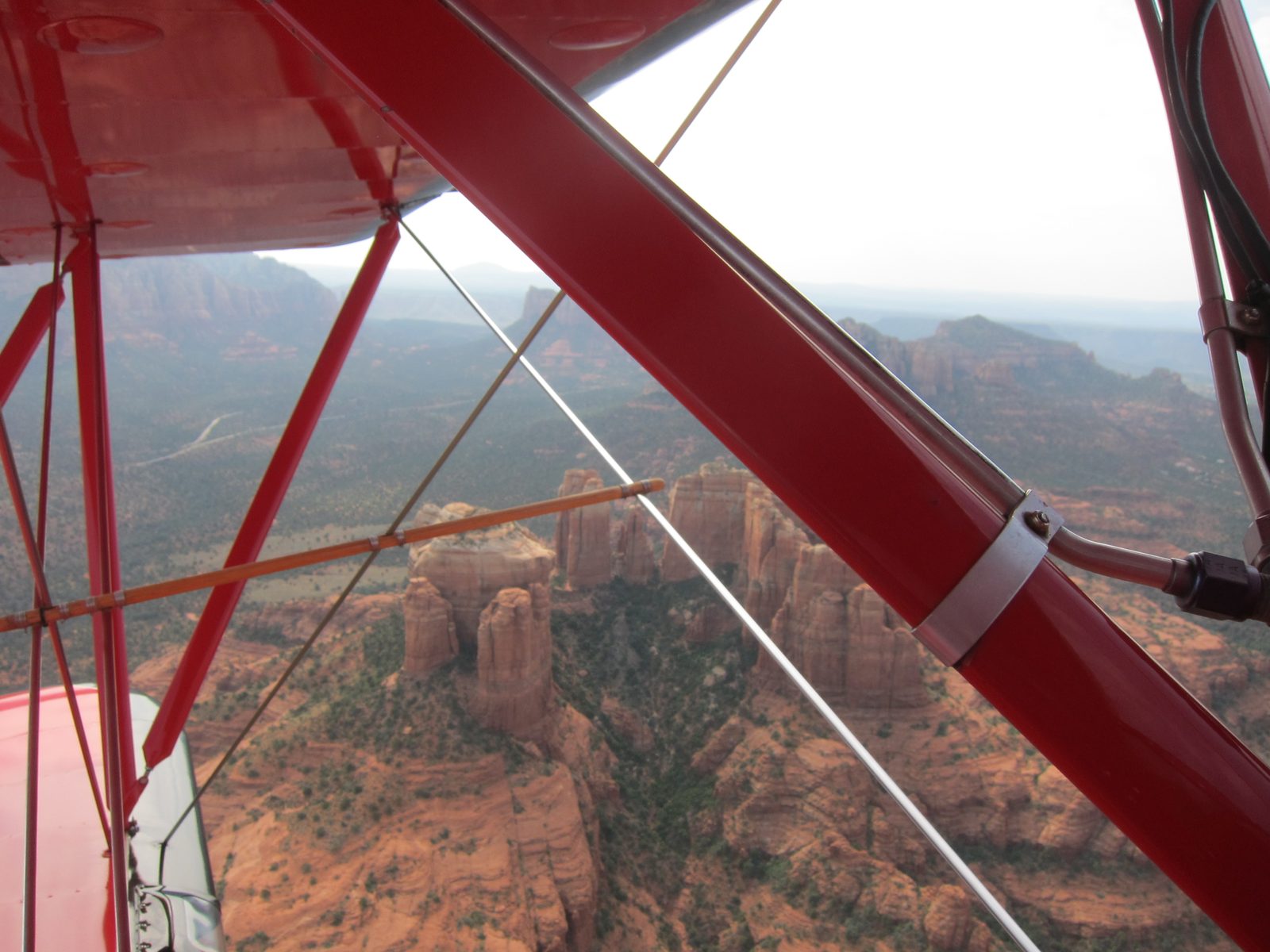 In the air, and out over the red rock formations