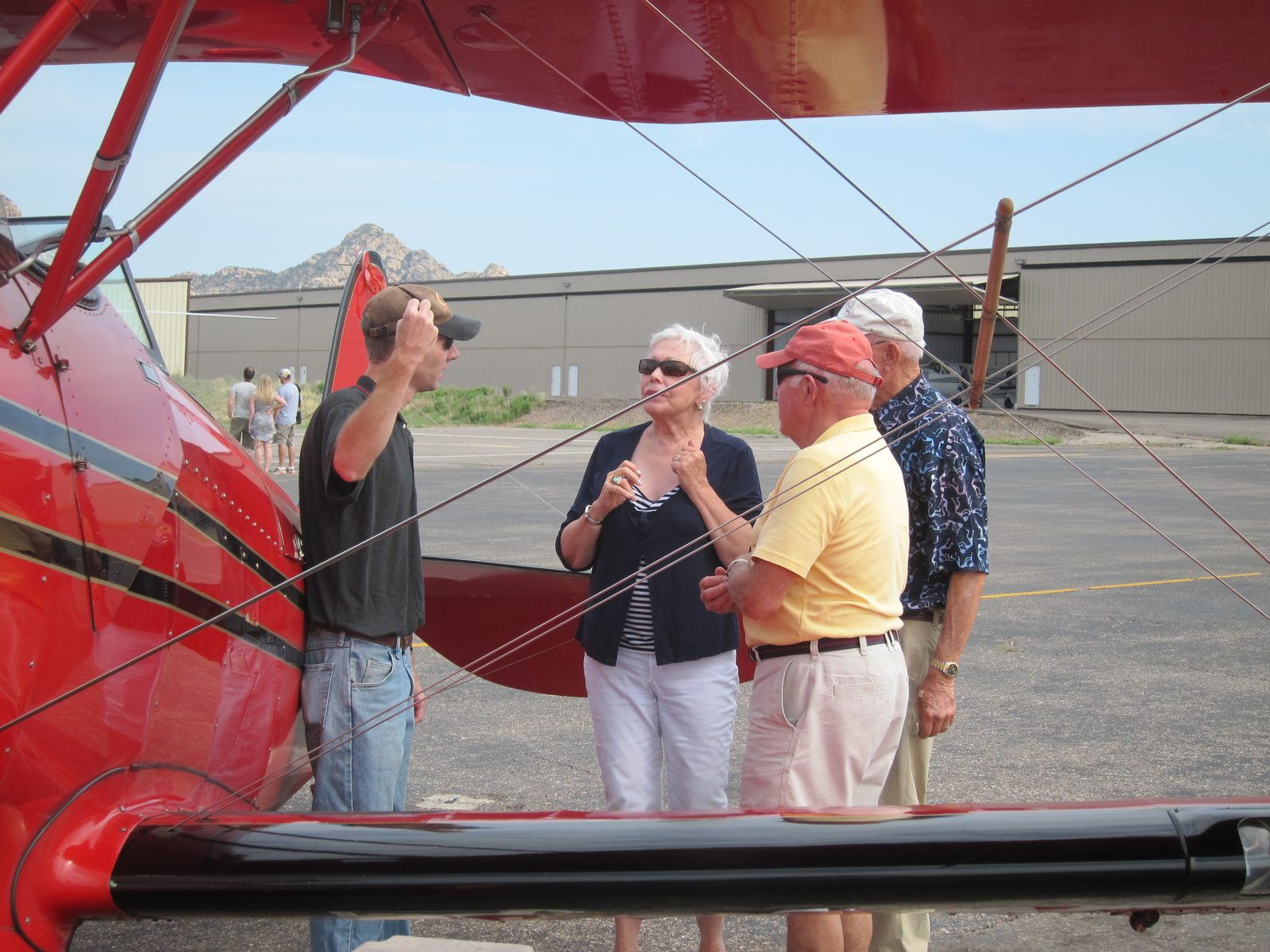 Having extricated themselves (no pictures, please) they discuss the flight with Pete