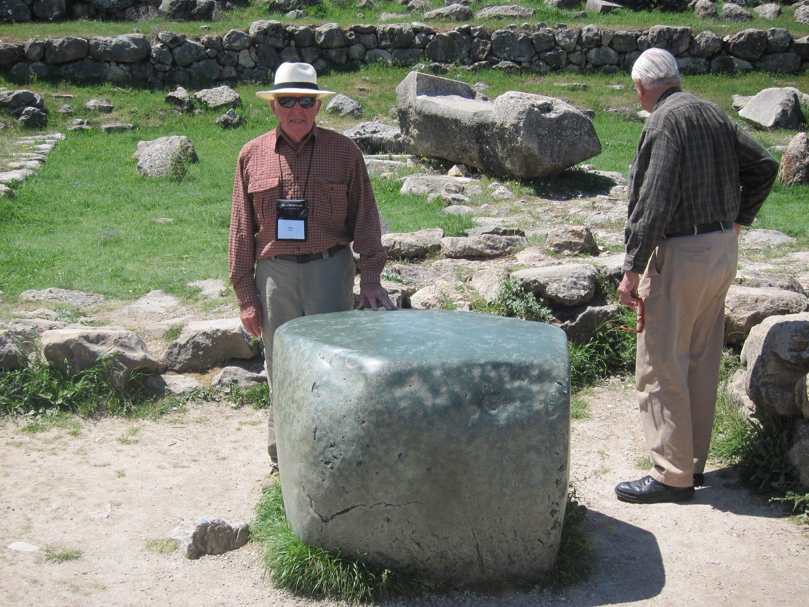 Green rock in the middle of the Hattusa ... no one knows why.  One of our group, Mac, checking...