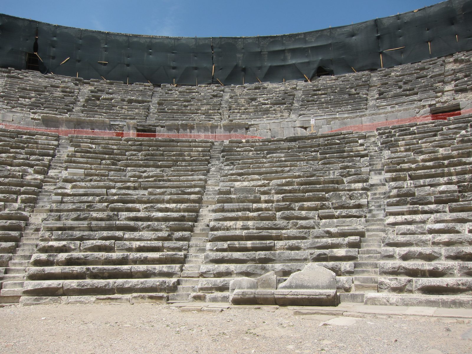 There were 21 rows of seats above the midsection surrounded by a wide gallery with 59 arches...