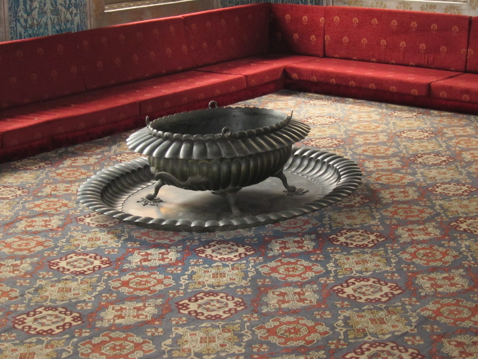 A fire pot for warmth.  Check out the rug ... and the coverings on the low settees.