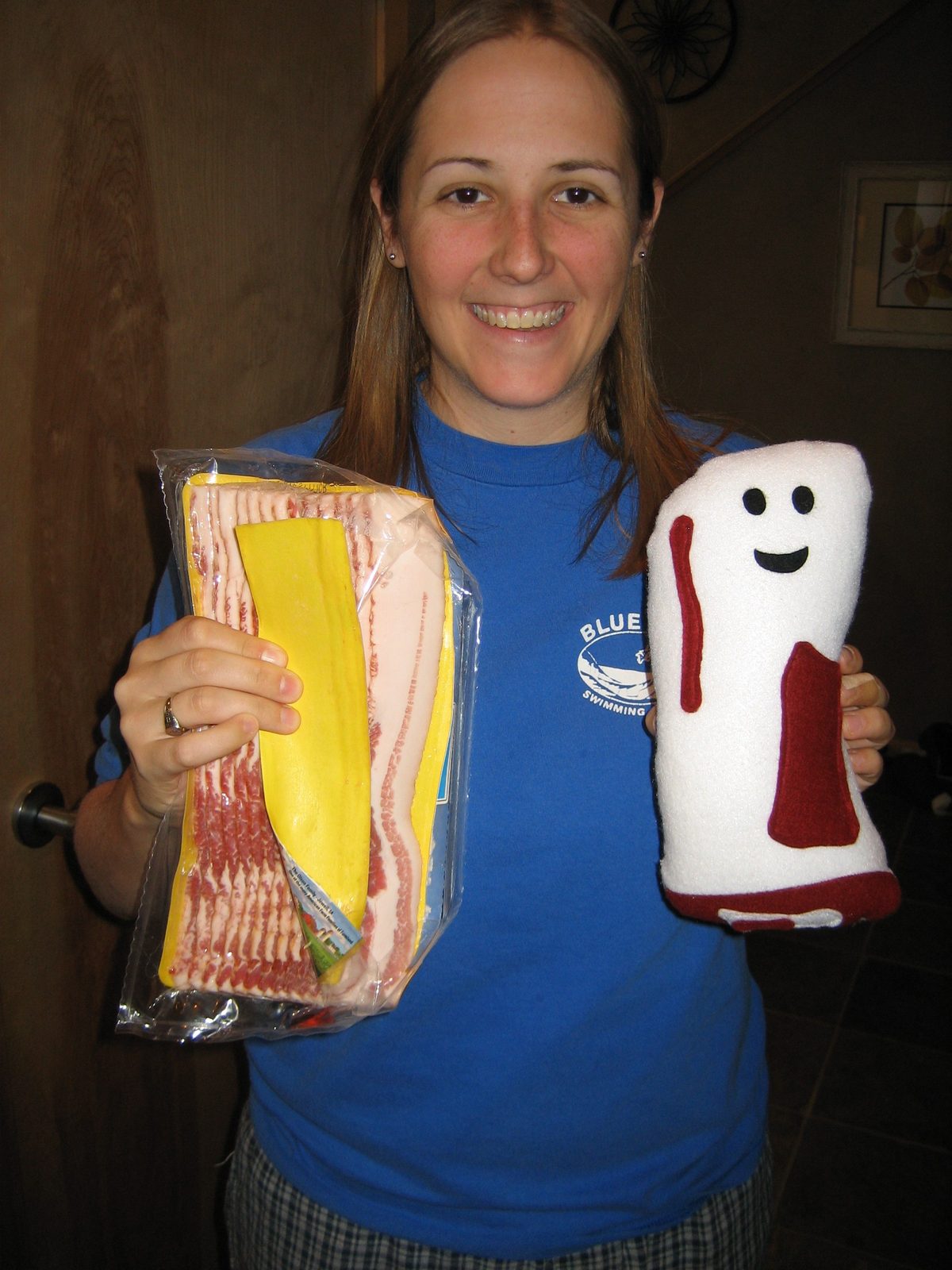 Catherine, bacon and Bacon-y, her new stuffed bacon.