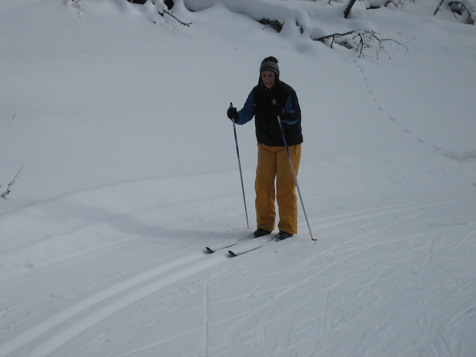 Catherine trekking along in the neat little tracks that the grooming machine puts on the sides...