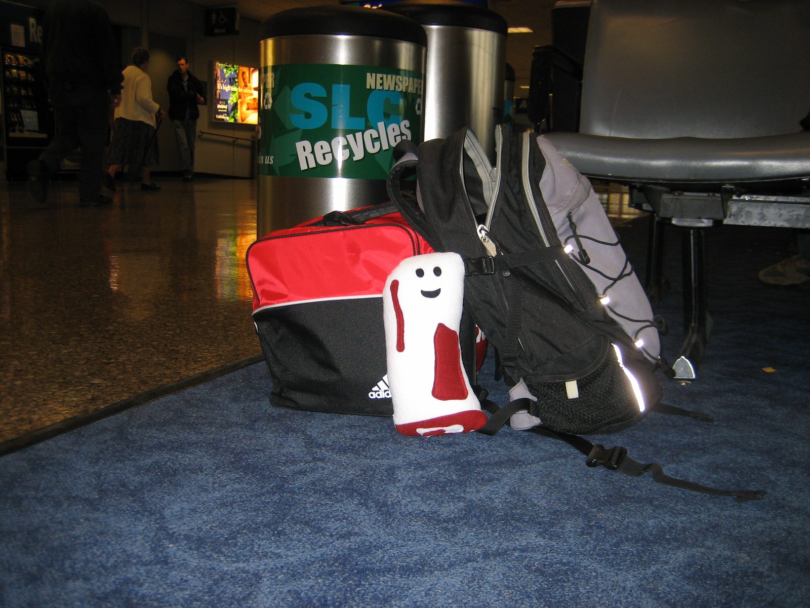 Bacon-y watches over his and Catherine's bags, so she can go to the bathroom without leaving...