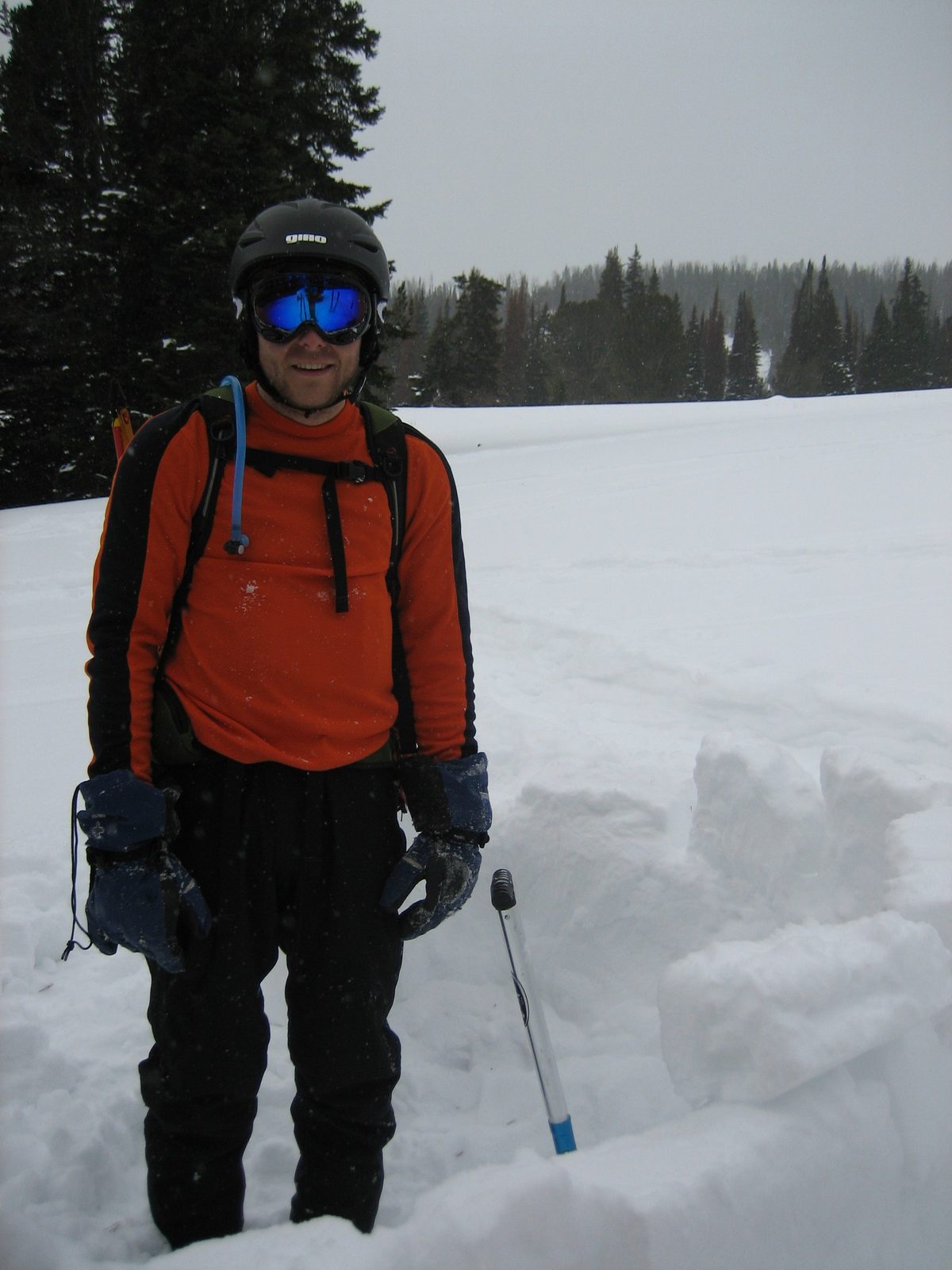 John, standing inside the igloo (under construction).