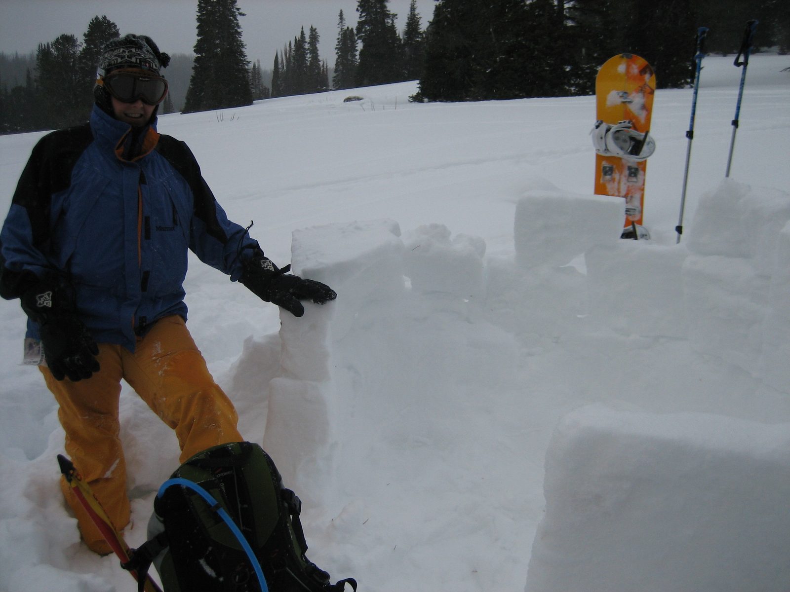 Catherine, a parting shot in front of her unfinished igloo.  The snow was very very dry and...