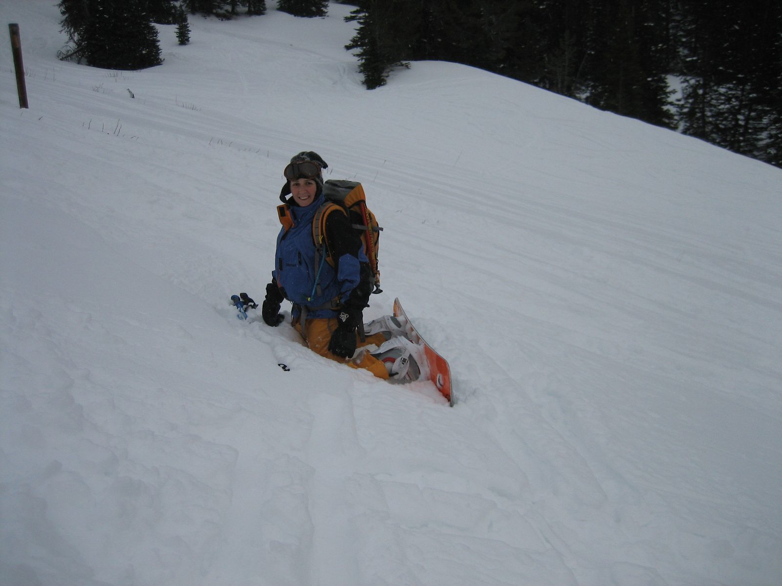 Catherine, amazingly color coordinated, pauses on the way down Beehive Basin.