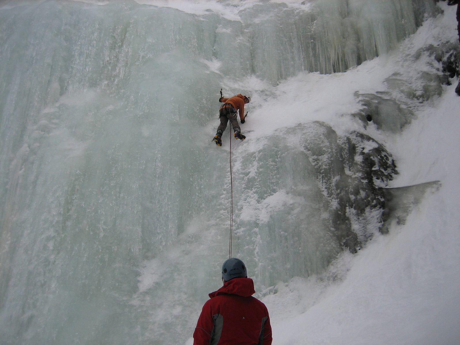 John belaying Joe, our guide.  And yes, despite this being a lead belay, you are supposed to...