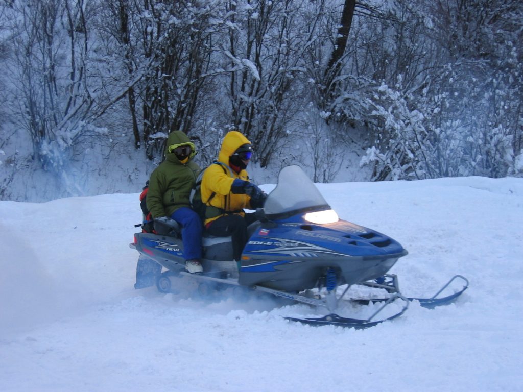 John (driver) and Catherine (passenger) on their snowmobile.