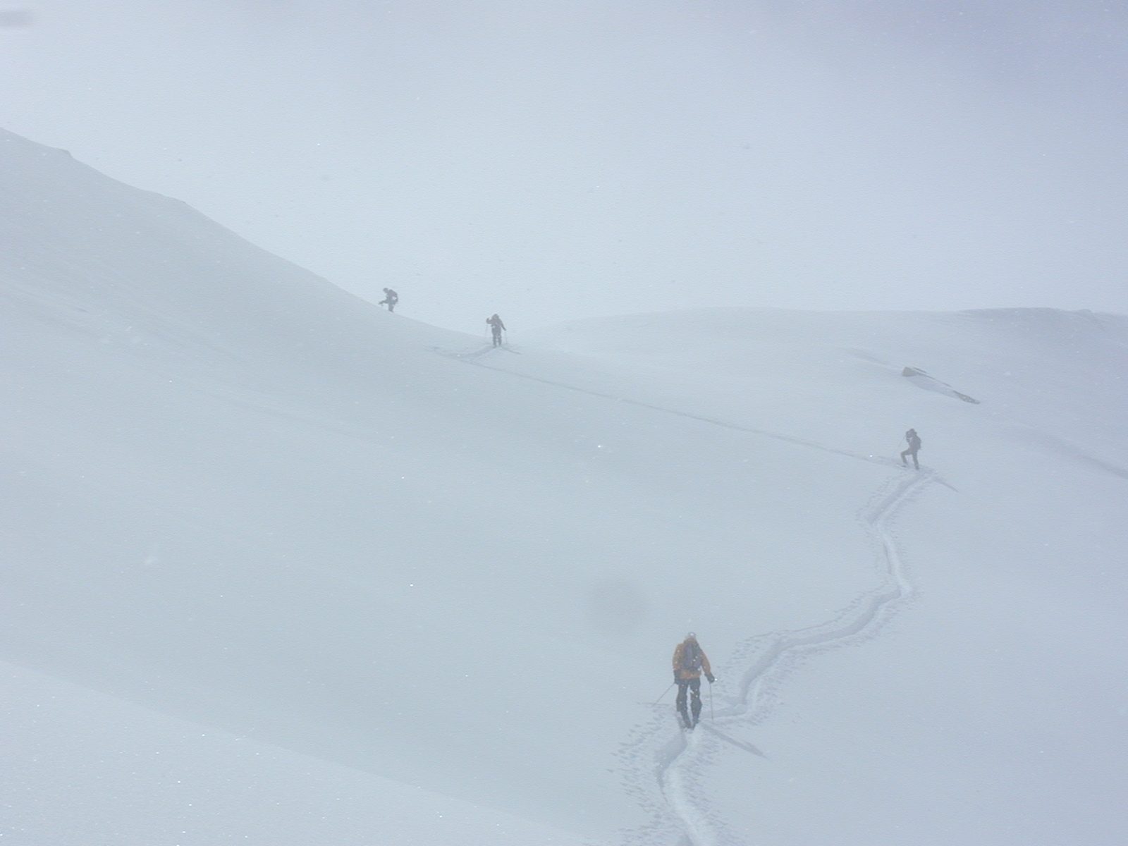 Bob, crossing an avalanche-prone slope just below the ridge of Alta peak.