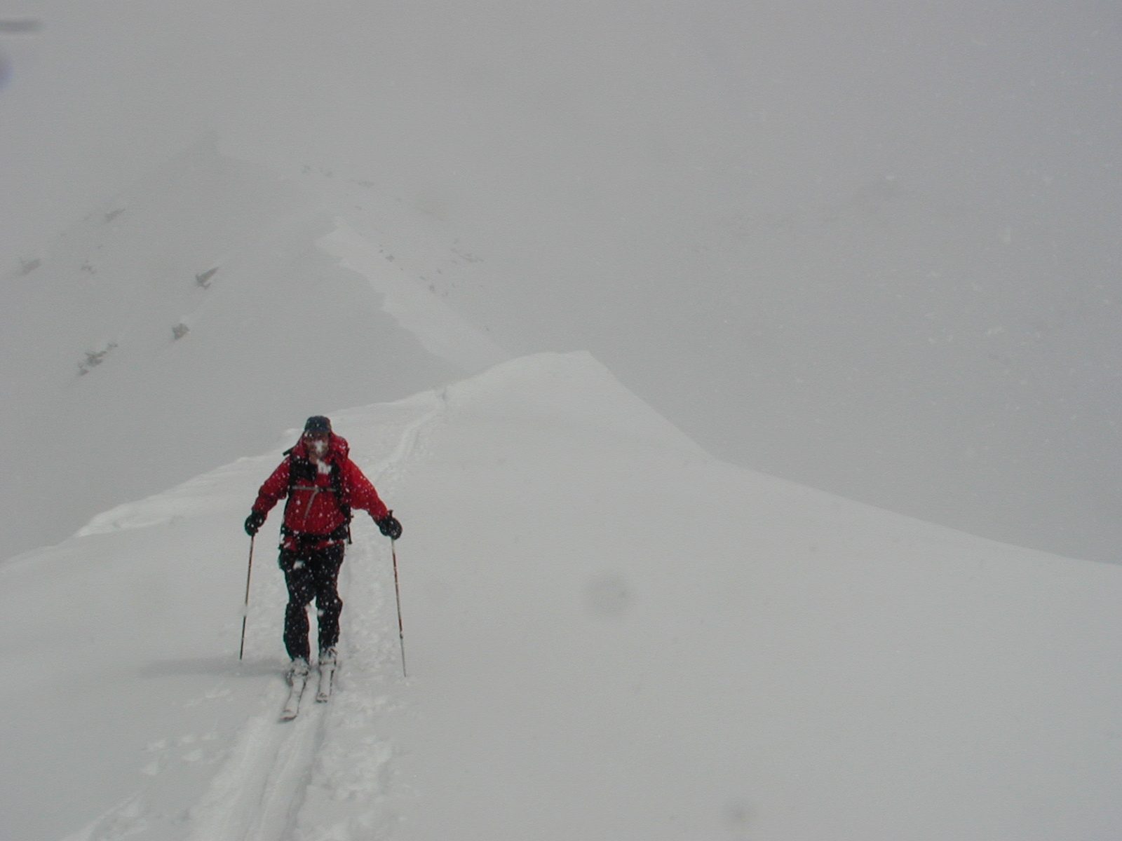 Jim, behind an unfortunately placed snowflake, on the ridge of Alta Peak.