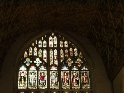 The stained glass window in one of the smaller chapels...