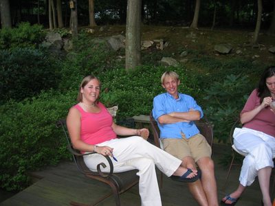 Catherine, Kristian, and half of Kelly on the back porch.