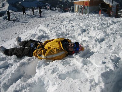 and considers doing snow angels.