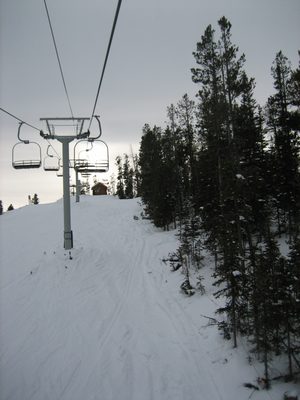 Riding the Lone Moose Triple up Flat Iron Mountain near...