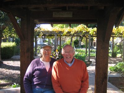 Mom and Dad by a well outside the Mission.
