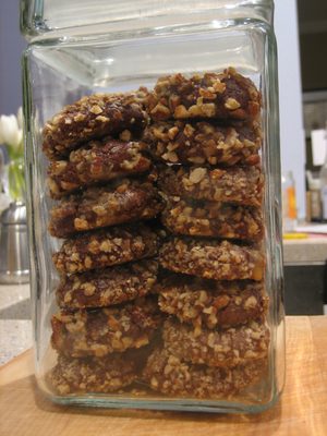 Chocolate pecan caramel cookies in their jar.