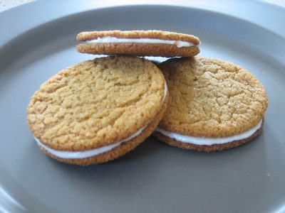 Molasses spice cookies with lemon filling.  I think...