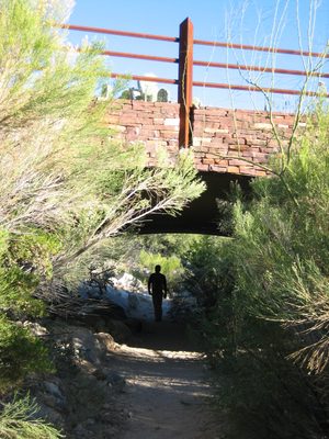 Cool little arch bridge with a hiker (Jay) beneath.