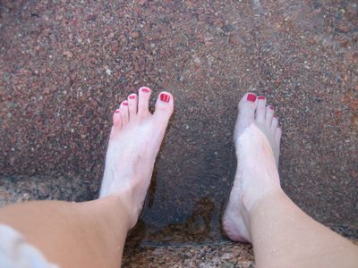 Catherine's happy* feet in the water.

* Minus the...