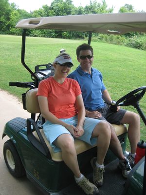 Catherine and Jay in the same cart.