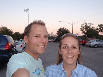 John and Catherine in the Zilker Park parking lot, while...