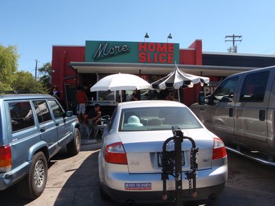 Home Slice's slice bar, next door to the main store,...