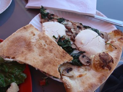 Close up of the white pizza and the bottom of the...