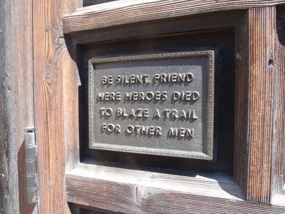 A plaque outside the Alamo.