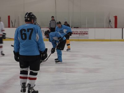 Faceoff!  Get ready for the puck, Steve (#67).