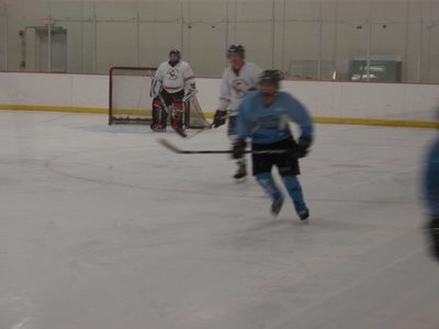 Skating out of the zone.