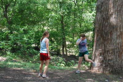 Kerry and Kelly play with a hackysack.