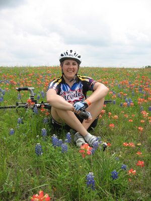 Sitting in the flowers.  I hope I didn't crush any,...